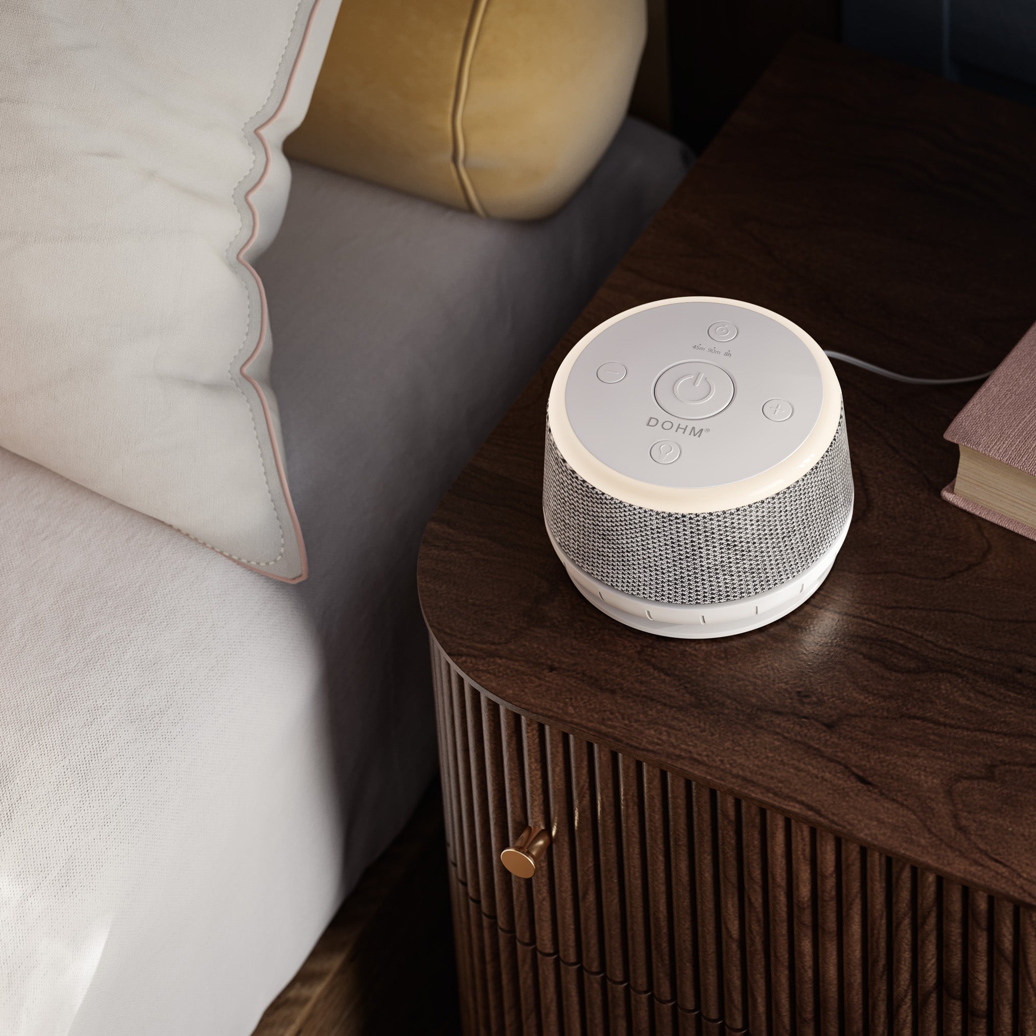 Yogasleep sound machine in a calm bedroom setting