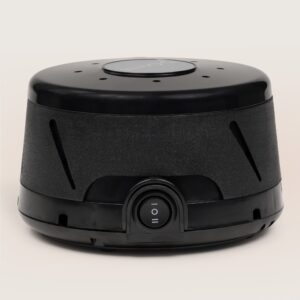 Front view of Dohm Classic in black showcasing front power dial and angled air vents on a neutral beige background