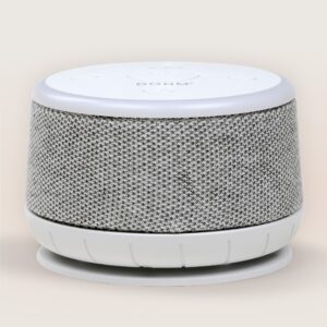 Front angled view of Dohm Nova sound machine showcasing gray knit fabric speaker wrap and white top control panel on pale beige background