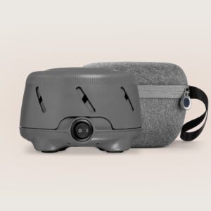 Front view of Dohm Uno and protective travel case showcasing the device power switch and zippered fabric case on a neutral background