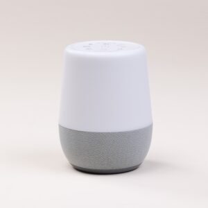 Front view of Duet sound machine showcasing top controls and gray fabric base against a light background
